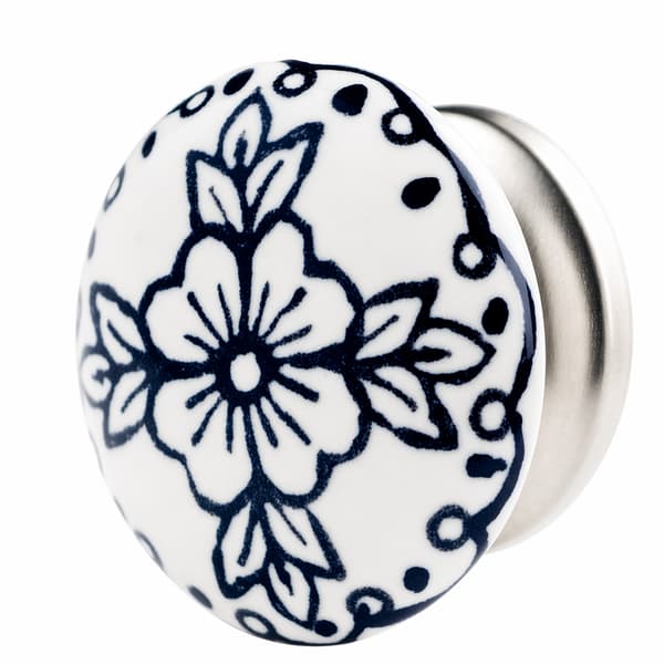 Vit knopp i porslin med blomma och blad